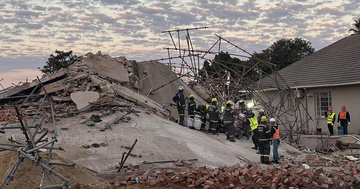 Hope for survivors of building collapses in South Africa fuels massive search and rescue operation